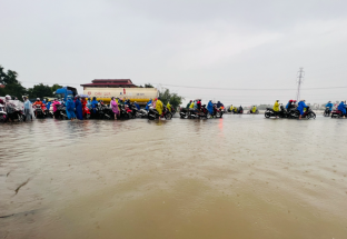 Nước lũ tràn qua QL1A, Quảng Nam cảnh báo rủi ro thiên tai cấp 3