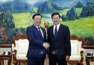 Tổng Bí thư, Chủ tịch nước Lào đánh giá cao kết quả hợp tác giữa Hà Nội và Vientiane