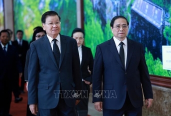 Thủ tướng Phạm Minh Chính gặp Tổng Bí thư, Chủ tịch nước Lào Thongloun Sisoulith